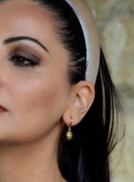 Orecchini Sole indossati – Gioielli con significato